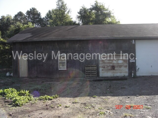 Building Photo - Earth Contact home on 5 acres!