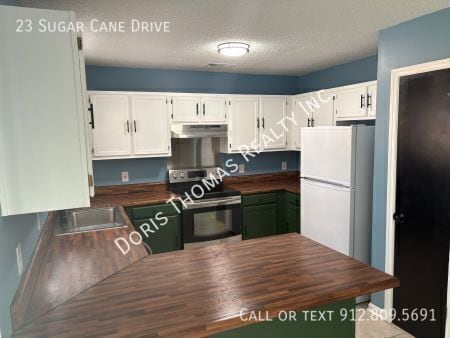 Building Photo - 23 Sugar Cane Dr