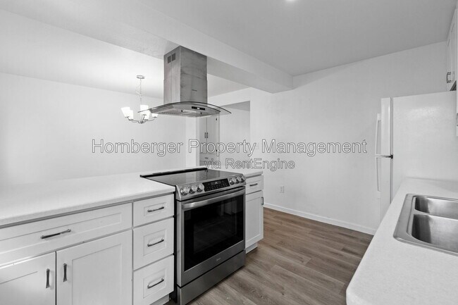 Building Photo - 2815 E 37th Ave