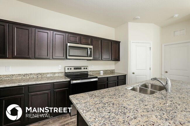 Building Photo - 3077 Neverland Dr