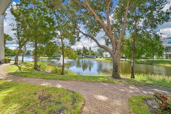 Building Photo - AVAILABLE January 2026 - 1/1 Condo - Across from Coconut Point - No Pets