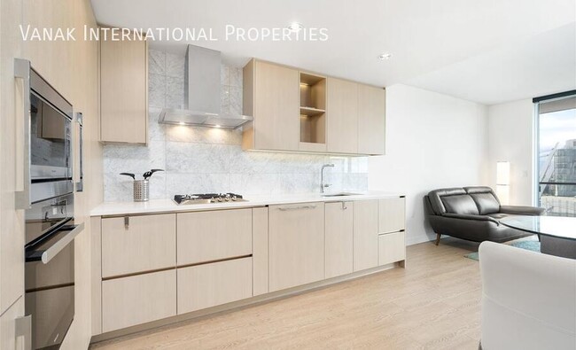 Photo du bâtiment - Modern 1-Bedroom Apartment with Stunning V...