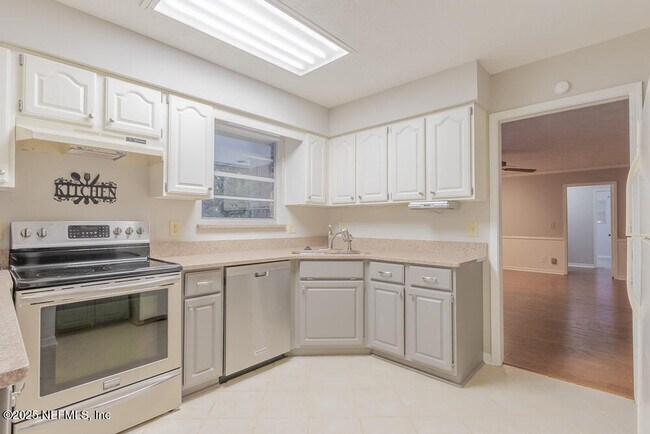Foto del edificio - 5430 Woodwind Terrace