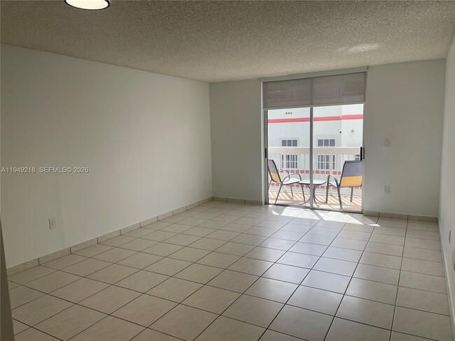 Building Photo - 3588 Collins Ave