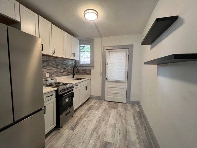 2nd entrance to apartment into kitchen - 669 Avenue B NW