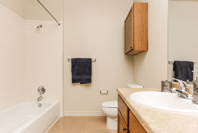 2BR, 2BA - 989SF Bathroom - Woodlawn Ranch Apartments