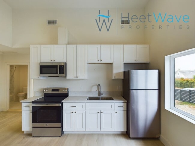 Building Photo - Modern Comfort and Convenience- Your Ideal...