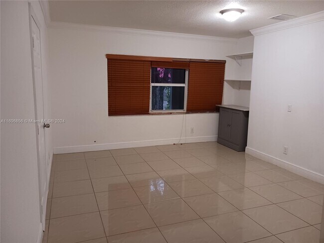 Building Photo - 650 Southwest 44th Court Apt #A, Coral Gab...