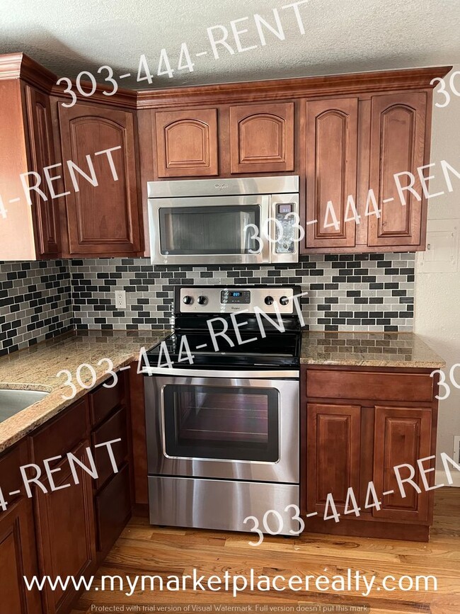 Building Photo - 5 Bedrooms & 2 Bathrooms walking distance to the Sheridan Light Rail Station!