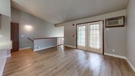 This contemporary 900 square foot apartment in Canopy Trails I offers a well-designed living space with two bedrooms and two bathrooms. The open-concept layout seamlessly integrates the kitchen and living areas, creating a spacious feel. The primary bedroom, measuring 170 square feet, provides ample space for relaxation.

Throughout the apartment, wood-look flooring adds warmth and durability. Large windows in the bedrooms and living area allow natural light to flood the space, enhancing the bright and airy ambiance. The kitchen features modern appliances, granite countertops, and ample cabinet space, perfect for culinary enthusiasts.

Both bathrooms are thoughtfully designed with clean lines and updated fixtures. The apartment includes a convenient hallway and closet space for additional storage. Baseboard heating ensures comfort throughout the seasons.

The overall design emphasizes functionality and modern aesthetics, with neutral color schemes that allow for personalization. This single-story apartment offers a harmonious blend of style and practicality, ideal for those seeking a contemporary living space in a desirable location.