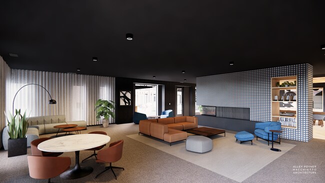 Salón para residentes con chimenea - FRAME Apartments