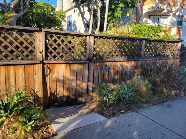 Perimeter fence of the property - 1322 Grand Ave