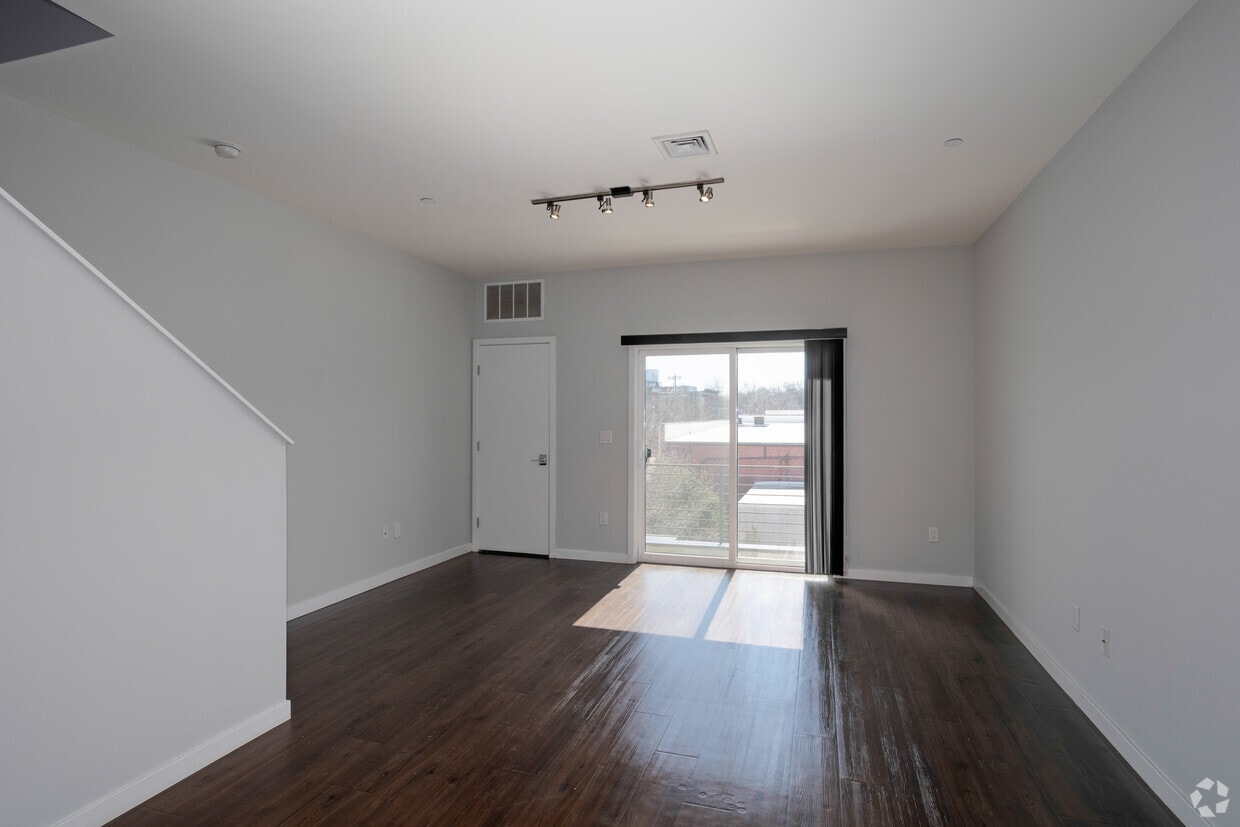 1BR, 1BA - 874SF - Double Balcony - Living Room - The Flats at Brewerytown