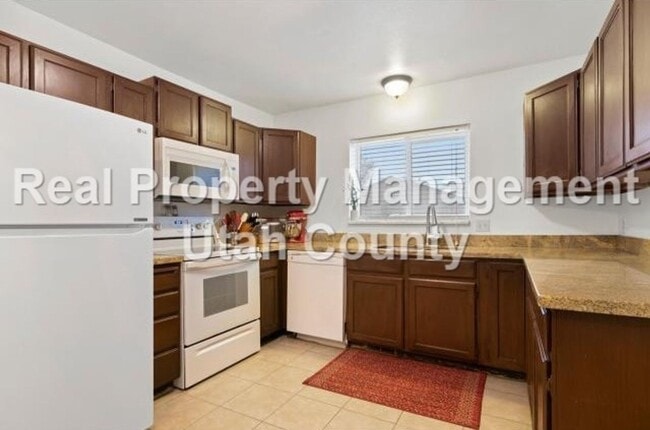 Building Photo - Condo for Rent in Orem's Amiron Village!