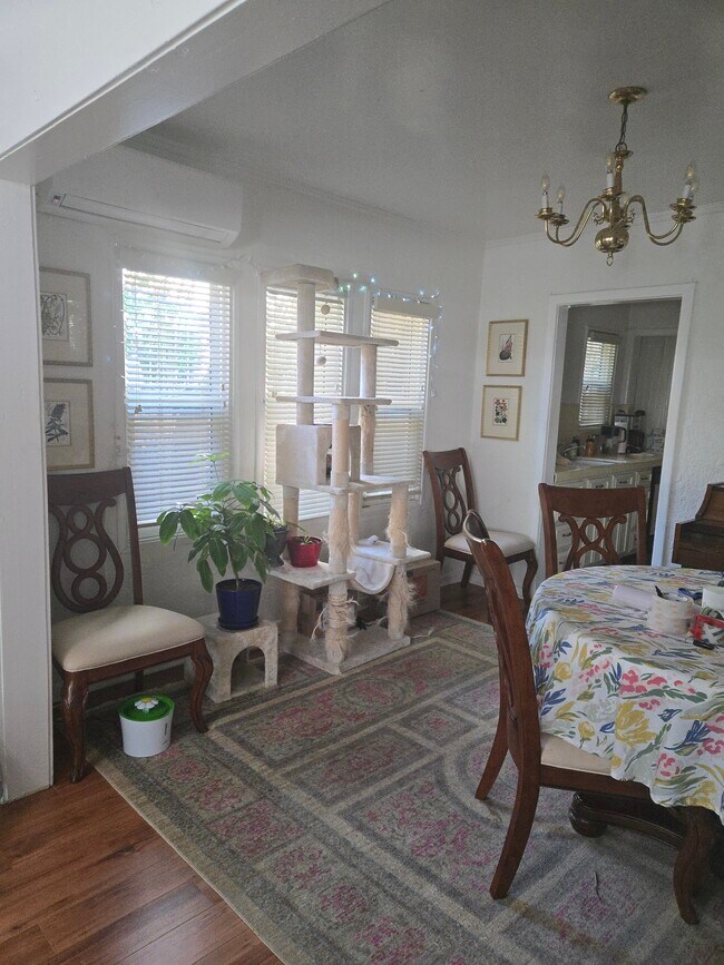 View from living room to dining room and door to the kitchen - 430 S Oakhurst Dr
