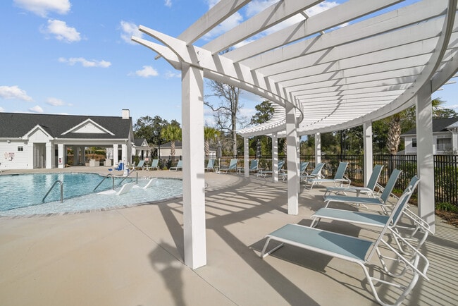 Resort Pool Deck - Beaumont Oaks at Porters Neck Apartments & Townhomes