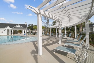 Resort Pool Deck - Beaumont Oaks at Porters Neck Apartments & Townhomes