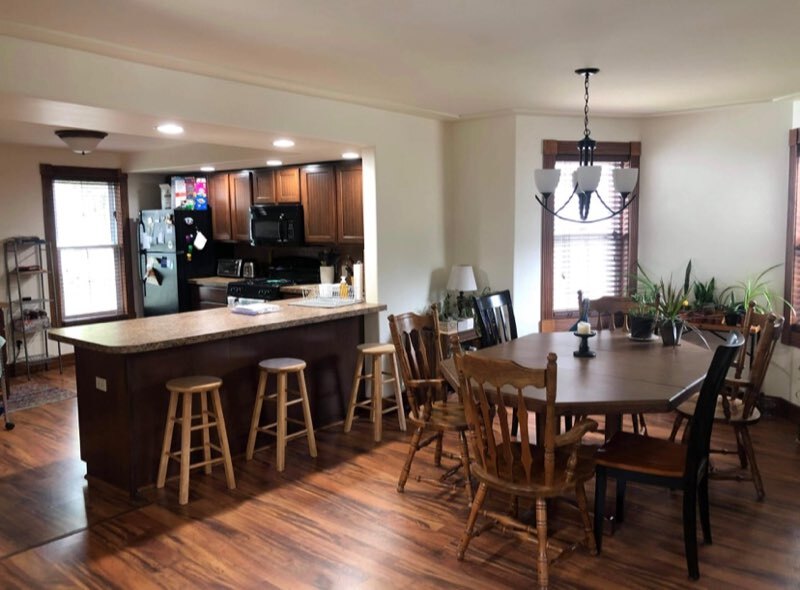Dining room looking into the kitchen. Nice open floor plan on the main level. - 246 Gold Ave NW