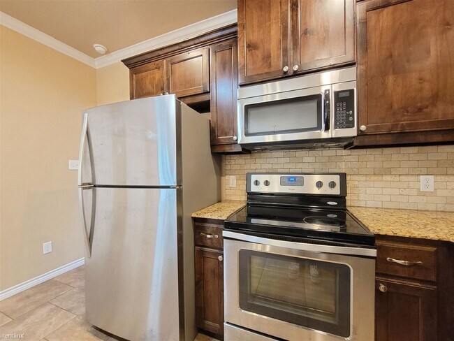 Foto del edificio - 4 br, 4 bath 4plex - 4168 Golden Eagle Dr B