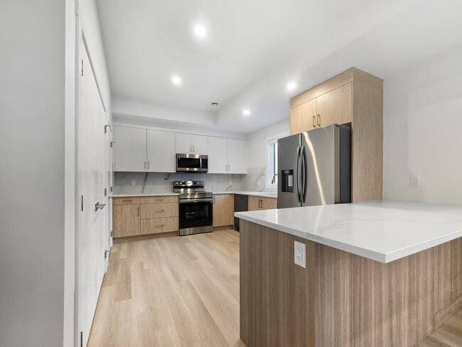 Building Photo - 6123-6133 33 Ave NW