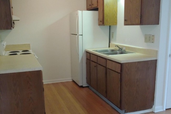 Stove and Refrigerator furnished - 408 Whiteville Rd NW