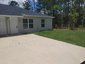 Building Photo - 9480 N Travis Dr