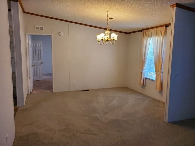 Building Photo - Charm & Commuter Convenience – 3BR/2BA Outside City Limits