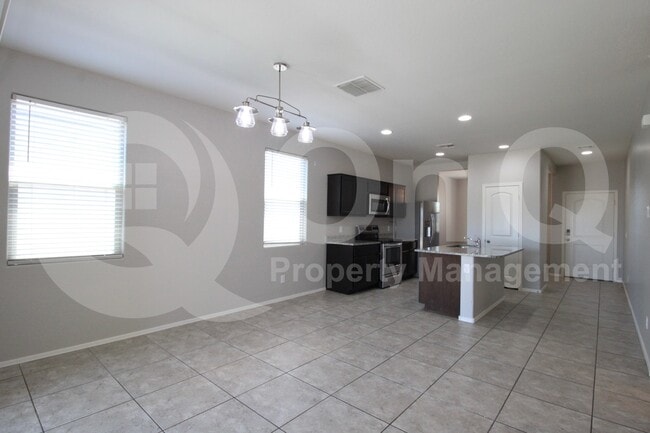 Building Photo - 37710 W Amalfi Ave