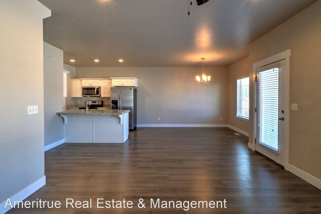 Building Photo - 4 br, 2.5 bath House - 7583 N. Cottage Lane