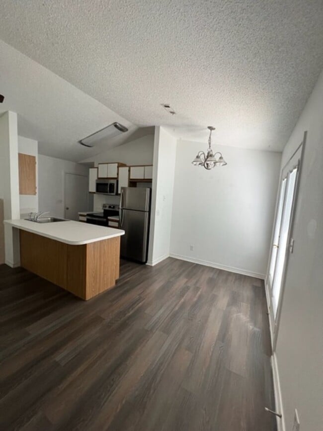 Building Photo - *COMING JULY* Easy Living! 2BR/1.5BA with Garage & Lawn Care Included *No Pets*