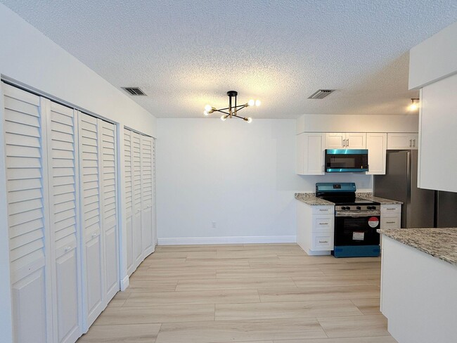 Foto del edificio - 4055 NW Cinnamon Tree Cir