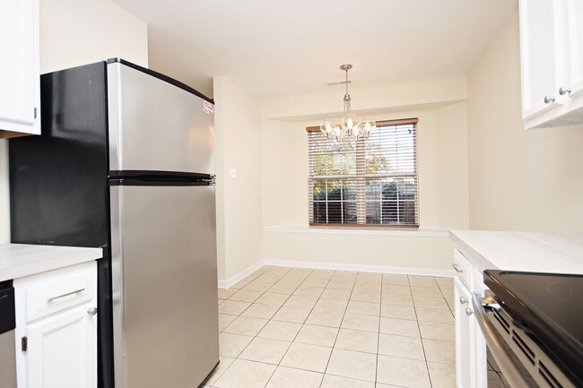 Building Photo - End-Unit Village Square Townhome (Applicat...