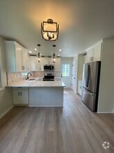 Building Photo - 5910 Teakwood Dr