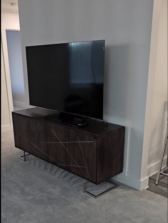 65" TV with buffet - 10201 Grosvenor Plz
