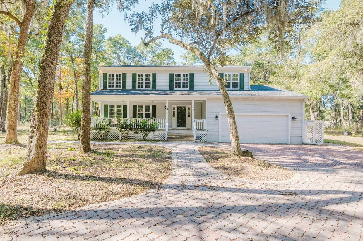 Foto principal - Secluded Four Bedroom Home on Seven Acres in Midway Farms!