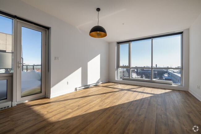 1BR, 1BA + DEN - 1059SF - Dining And Living Room - Labo Condos