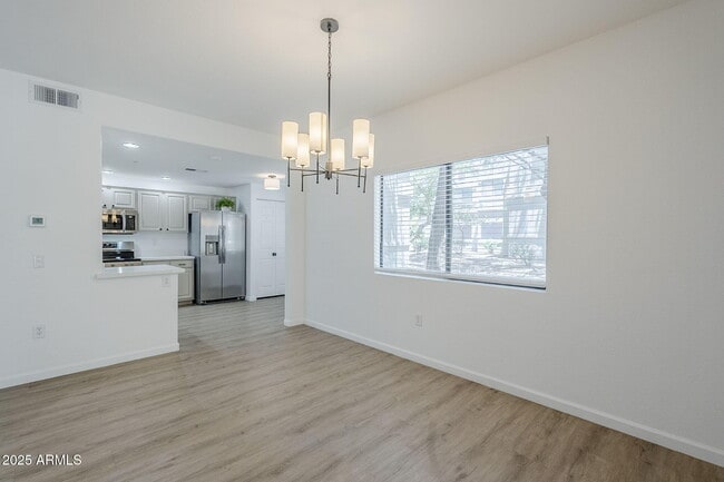 Building Photo - 9455 E Raintree Dr