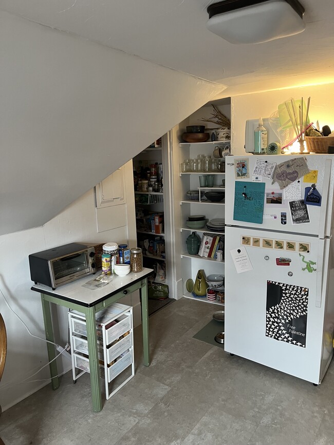 Kitchen with large pantry area - 114 Buell St