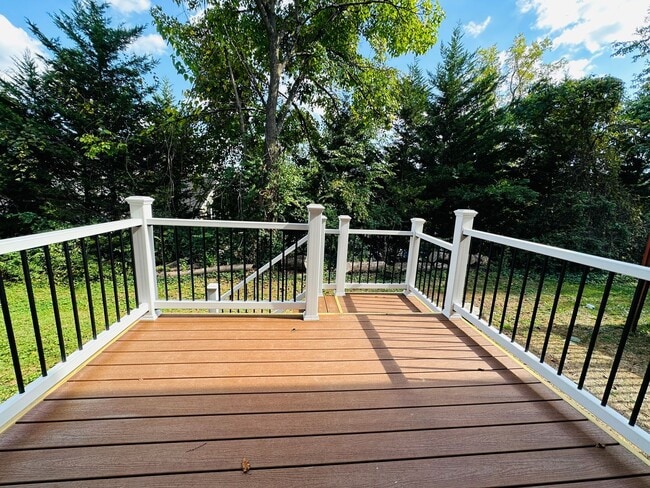 Photo - 2 bed, 2.5 bath updated townhouse w/ 1-car garage & Trex deck available now