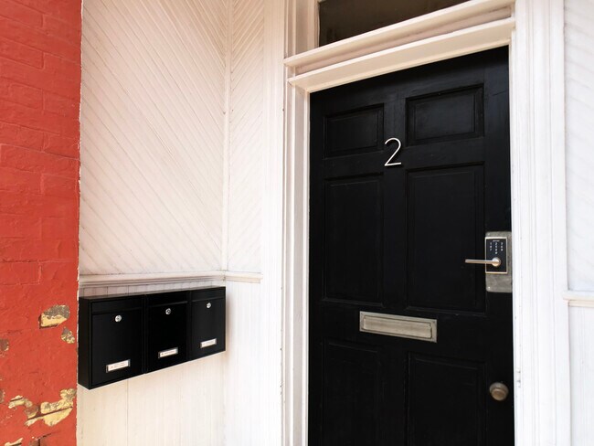 Front Door and Private Mailboxes - 2 N 1st St