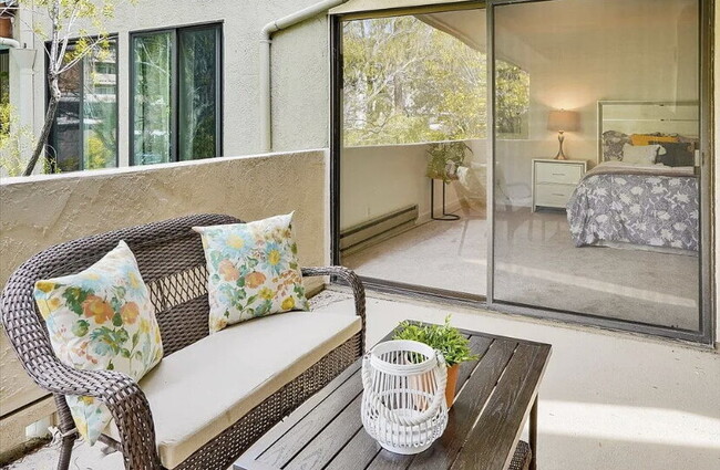 Building Photo - Welcome to this sun-filled spacious top fl...