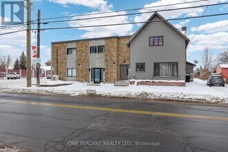 Building Photo - 6610 Fourth Line Rd