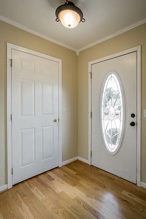 Coat closet upon entering home - 1166 Belmont Dr