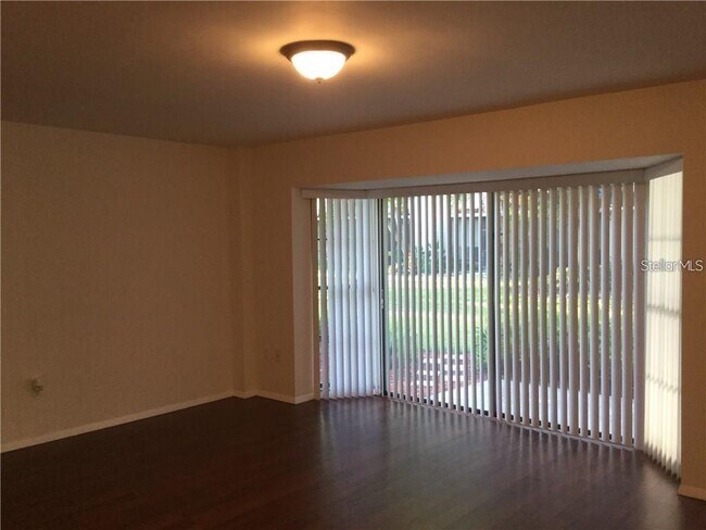 Building Photo - 5999 Village Cir N