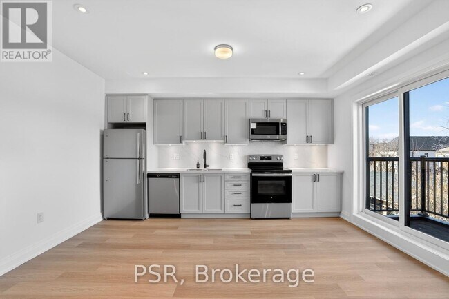 Photo du bâtiment - 218 Aileen Ave