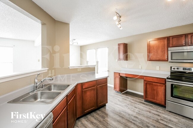 Building Photo - 10019 Olympic Cir
