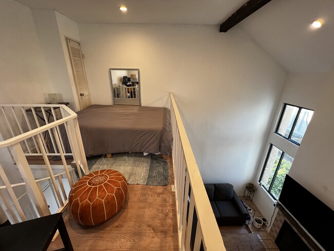Loft bedroom w/ storage - 8675 Falmouth Ave