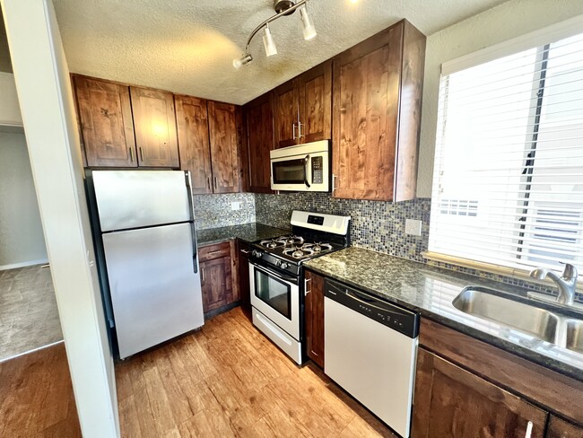 Experience cooking in style with this modern kitchen setup. - Sublime
