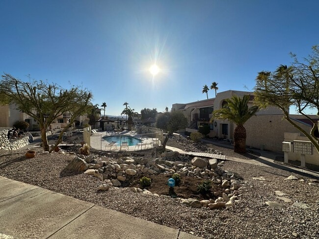 Building Photo - Long Term Unfurnished condominium - Commun...