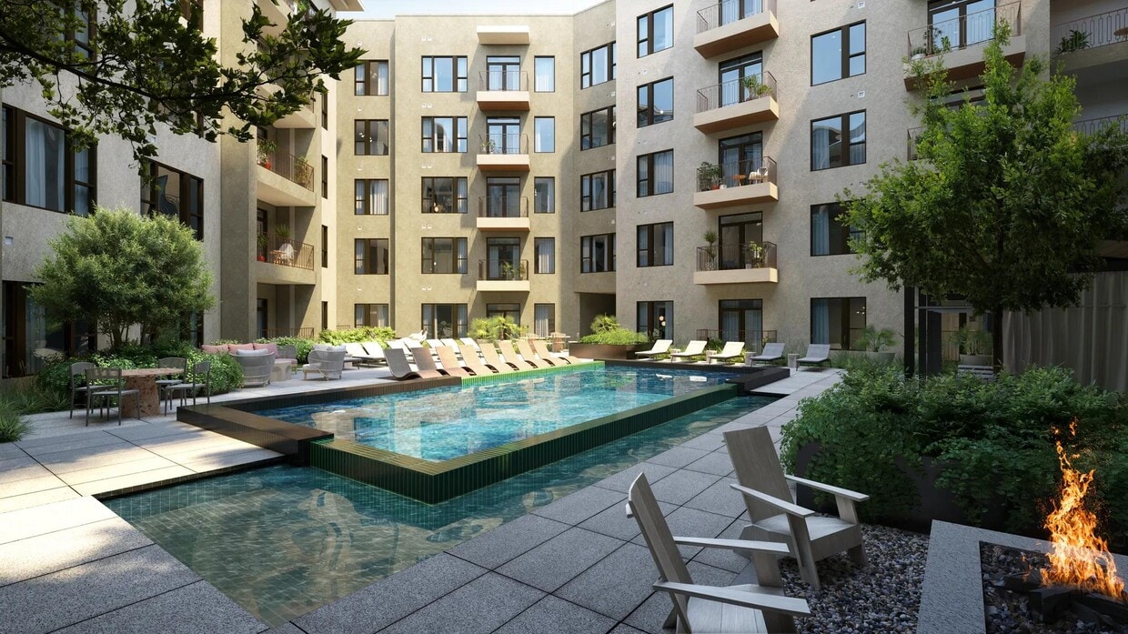 Relax out our resort-style pool with spacious sundeck, cabanas, and in-pool chaise lounges. - Modera Trailhead